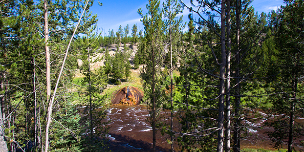 Landscape view of the intriguing Chocolate Pot Geyser as it bubbles alongside the fast-moving Gibbon River (Yellowstone National Park, Wyoming) — original digital image © Martha Marks, marthamarksphotography.com, all rights reserved